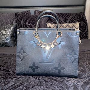 Black Louis Vuitton On The Go hand bag